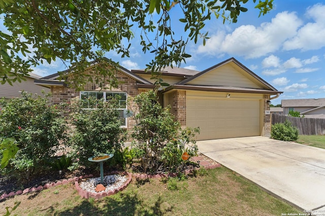 7303 Altair Loop, San Antonio, TX 78252 - single story home with fence, brick siding, a garage, and driveway