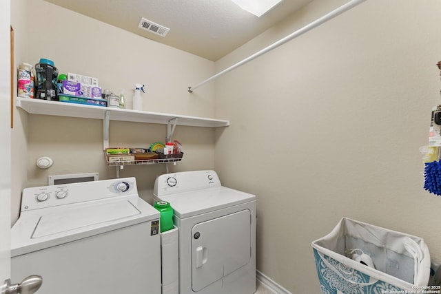 7303 Altair Loop, San Antonio, TX 78252 - clothes washing area featuring separate washer and dryer and baseboards