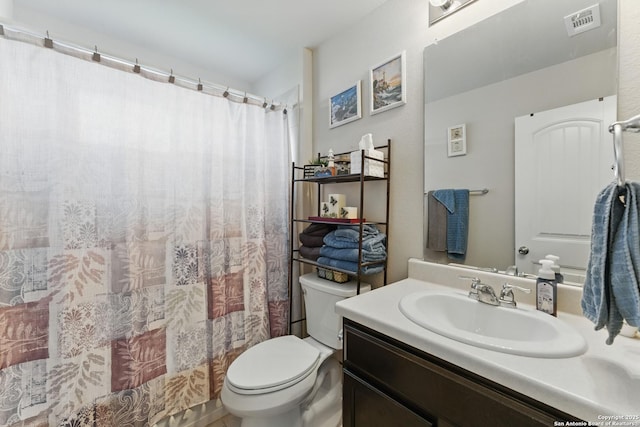 7303 Altair Loop, San Antonio, TX 78252 - full bathroom featuring toilet, vanity, and a shower with curtain