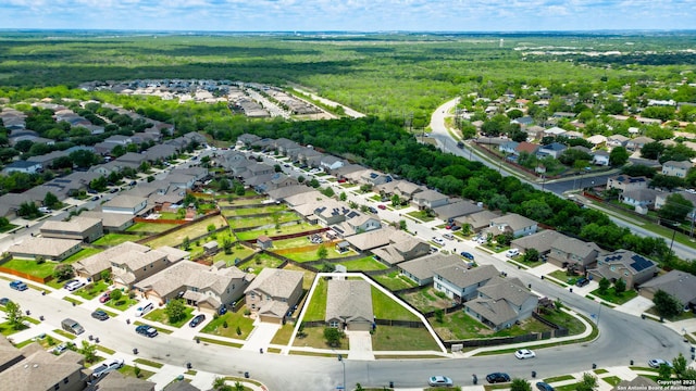 7303 Altair Loop, San Antonio, TX 78252 - aerial view of property's location featuring nearby suburban area and a heavily wooded area