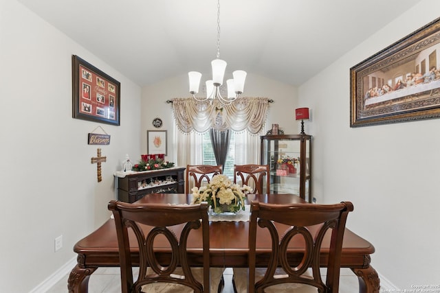 7303 Altair Loop, San Antonio, TX 78252 - tiled dining area featuring a chandelier, vaulted ceiling, and baseboards