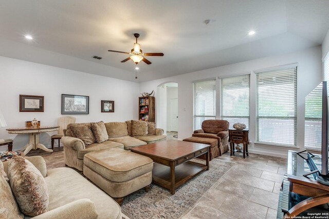 15342 Fort Marcy, San Antonio, TX 78245 - living area with arched walkways, a ceiling fan, baseboards, recessed lighting, and light stone finish floors