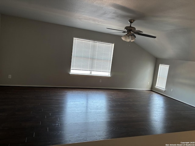 12131 Lantana Cv, San Antonio, TX 78253 - unfurnished room with a ceiling fan, dark wood finished floors, lofted ceiling, and baseboards