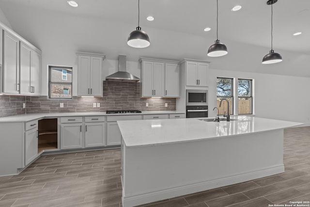 2171 Oak Run Pkwy, New Braunfels, TX 78132 - kitchen featuring wall chimney exhaust hood, a sink, wood tiled floors, oven, and recessed lighting