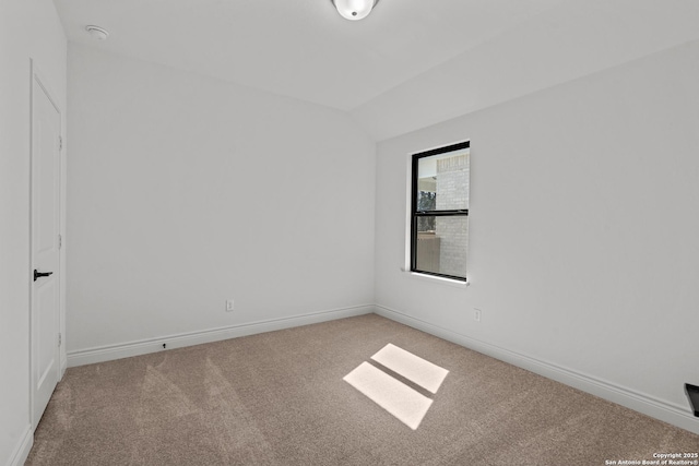 2171 Oak Run Pkwy, New Braunfels, TX 78132 - unfurnished room featuring light colored carpet, lofted ceiling, baseboards, and a smoke detector