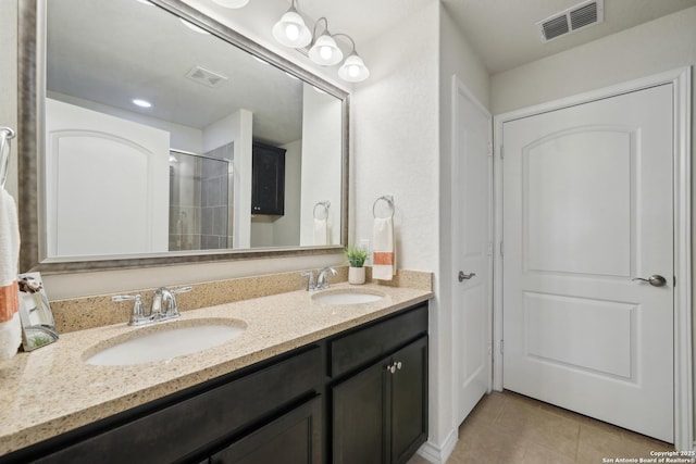3819 Singing Water, San Antonio, TX 78253 - bathroom with tile patterned floors, double vanity, and a stall shower