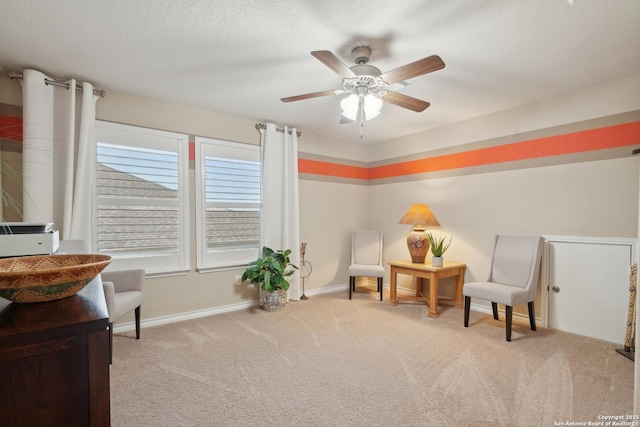 3819 Singing Water, San Antonio, TX 78253 - living area with carpet flooring, baseboards, and a ceiling fan