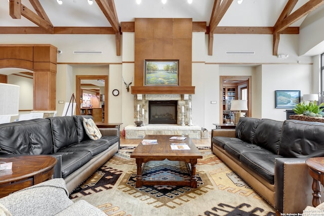 3819 Singing Water, San Antonio, TX 78253 - living area with beamed ceiling, a fireplace, and a towering ceiling