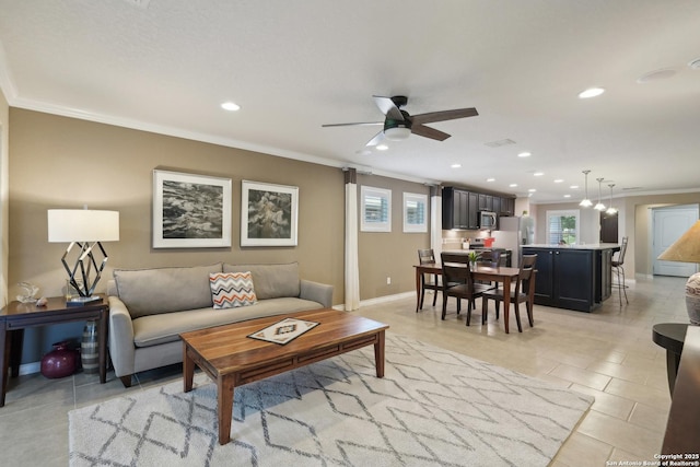3819 Singing Water, San Antonio, TX 78253 - living room featuring ornamental molding, recessed lighting, ceiling fan, baseboards, and light tile patterned floors