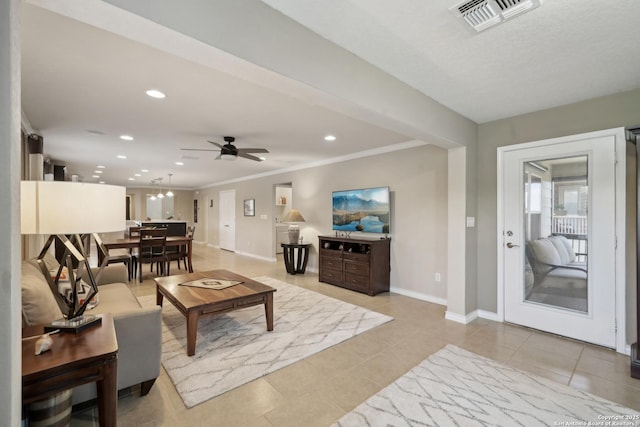 3819 Singing Water, San Antonio, TX 78253 - living area featuring baseboards, recessed lighting, a ceiling fan, crown molding, and light tile patterned floors