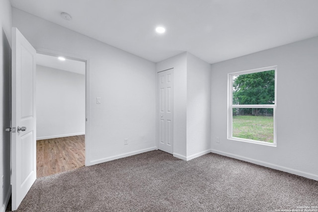 3018 Chihuahua, San Antonio, TX 78207 - unfurnished bedroom featuring carpet, baseboards, and recessed lighting