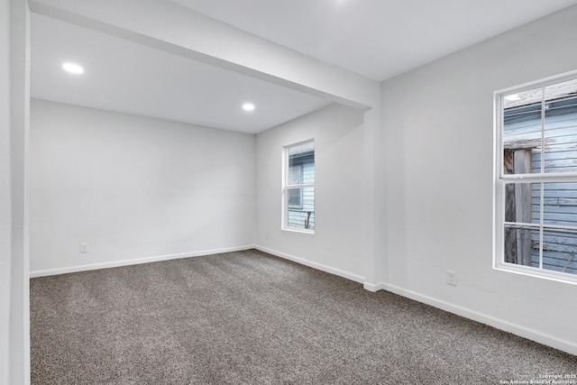 3018 Chihuahua, San Antonio, TX 78207 - spare room with dark colored carpet, baseboards, and recessed lighting