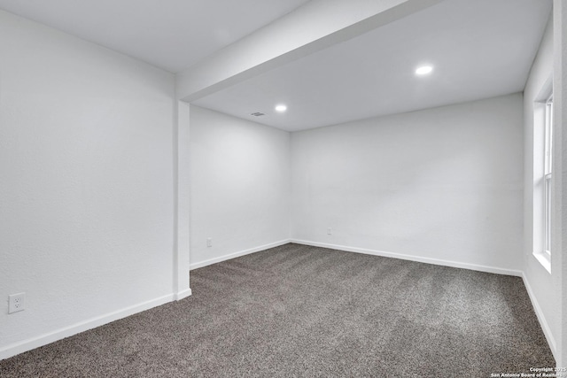 3018 Chihuahua, San Antonio, TX 78207 - empty room with dark carpet, recessed lighting, and baseboards