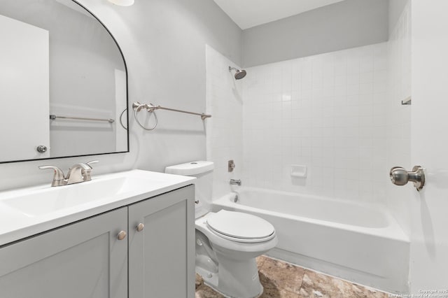 full bath featuring toilet, vanity, and shower / tub combination