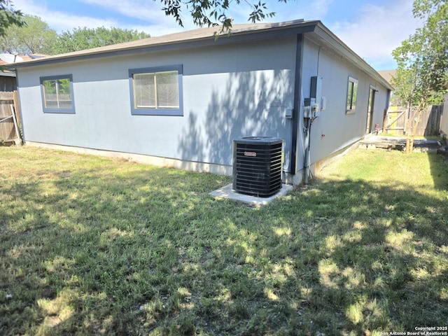 3123 Opal, San Antonio, TX 78245 - rear view of property with central AC unit