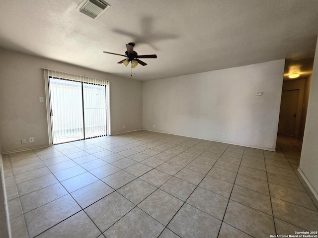 3123 Opal, San Antonio, TX 78245 - unfurnished room featuring a ceiling fan and light tile patterned flooring
