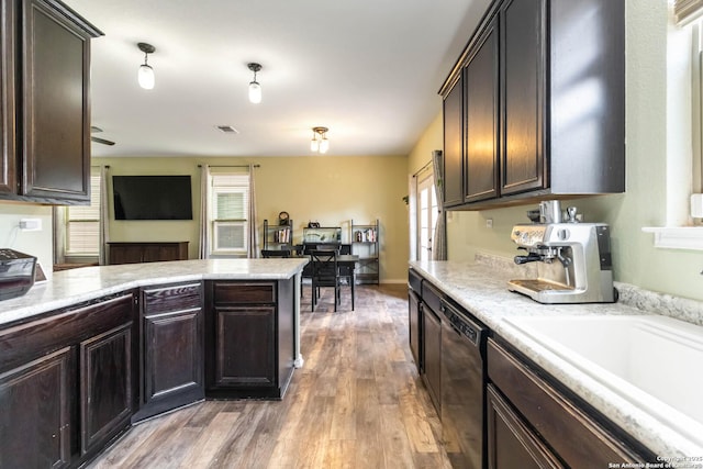 4351 E Safe Hbr, San Antonio, TX 78244 - kitchen featuring dishwasher, plenty of natural light, light wood-style floors, and dark brown cabinetry
