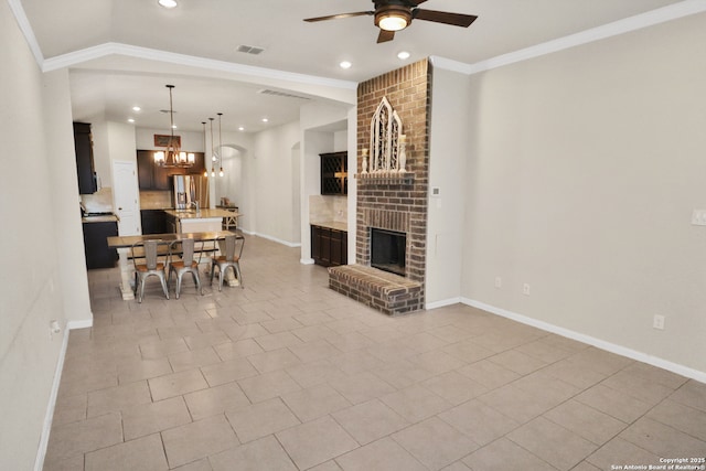 8228 Llano Parke, San Antonio, TX 78254 - tiled living area featuring ceiling fan, a brick fireplace, recessed lighting, ornamental molding, and baseboards