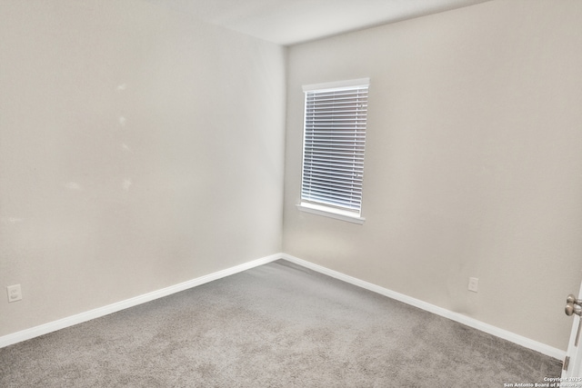 8228 Llano Parke, San Antonio, TX 78254 - empty room featuring dark carpet and baseboards