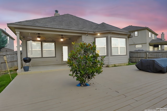 8228 Llano Parke, San Antonio, TX 78254 - rear view of house with a ceiling fan, a deck, and fence
