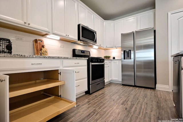 565 Rosemellow, New Braunfels, TX 78132 - kitchen with stainless steel appliances, white cabinets, backsplash, and dark wood-style floors