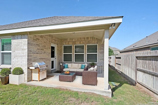 565 Rosemellow, New Braunfels, TX 78132 - view of patio with outdoor lounge area, a fenced backyard, a grill, and exterior kitchen