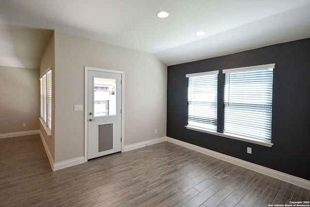 565 Rosemellow, New Braunfels, TX 78132 - entrance foyer featuring wood finished floors, lofted ceiling, baseboards, and recessed lighting