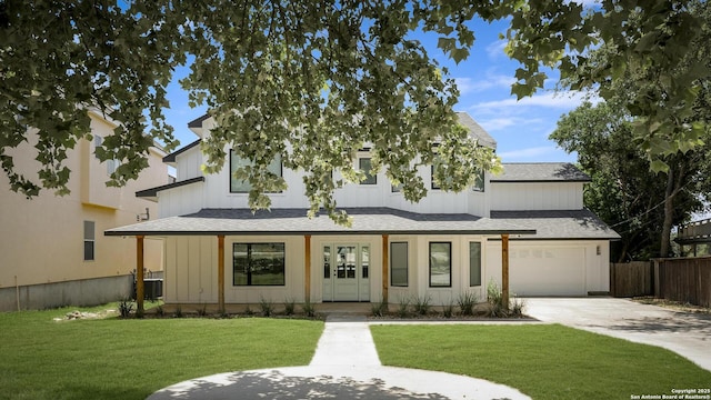 772 Lakebreeze, Canyon Lake, TX 78133 - modern inspired farmhouse featuring a shingled roof, driveway, board and batten siding, a garage, and central AC