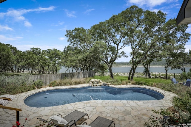 772 Lakebreeze, Canyon Lake, TX 78133 - view of swimming pool featuring a water view and a fenced backyard