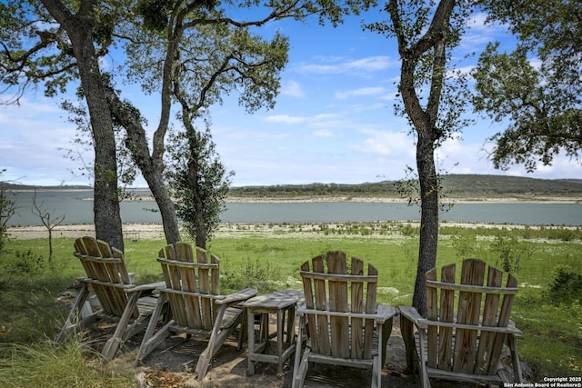 772 Lakebreeze, Canyon Lake, TX 78133 - view of green lawn featuring a water view