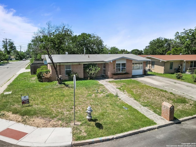 286 Goodhue, San Antonio, TX 78218 - single story home with brick siding, driveway, and a front lawn