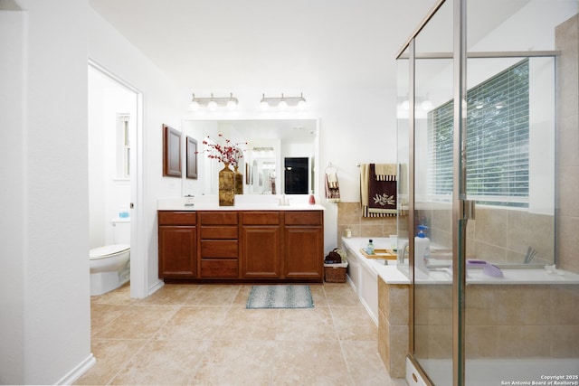 full bathroom with double vanity, a stall shower, a bath, toilet, and tile patterned flooring