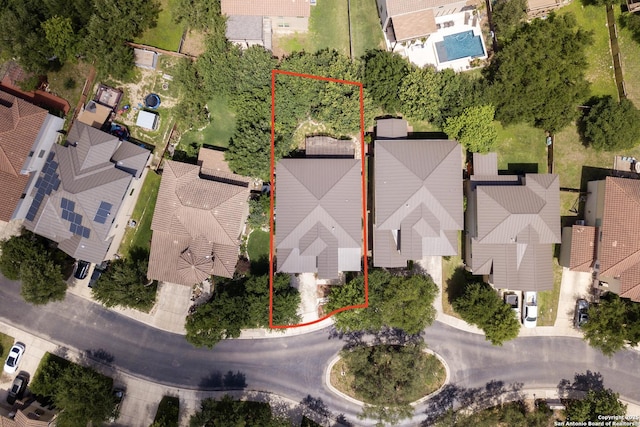 aerial perspective of suburban area with property boundaries highlighted