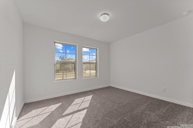141 Cheyenne Dr, Floresville, TX 78114 - unfurnished room featuring carpet flooring, baseboards, and a smoke detector