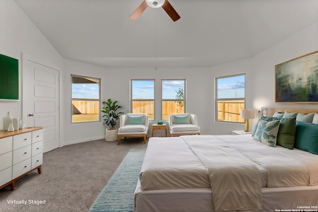 141 Cheyenne Dr, Floresville, TX 78114 - carpeted bedroom with lofted ceiling, ceiling fan, and baseboards