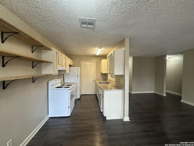 5107 Stockman Dr, San Antonio, TX 78247 - kitchen featuring white range with electric cooktop, a sink, baseboards, dark wood-style flooring, and a textured ceiling