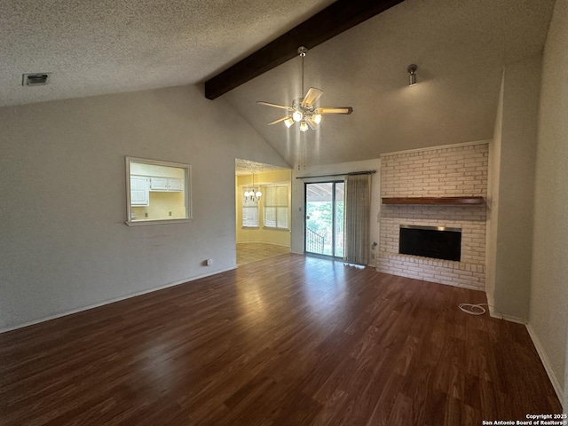 unfurnished living room featuring a ceiling fan, a brick fireplace, wood finished floors, a chandelier, and baseboards