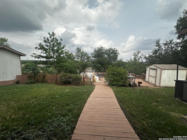 view of yard with a storage unit and an outdoor structure