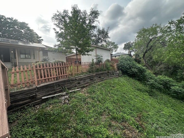 view of yard with fence