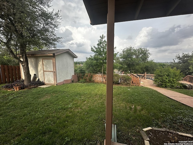 view of yard with a storage unit and an outdoor structure