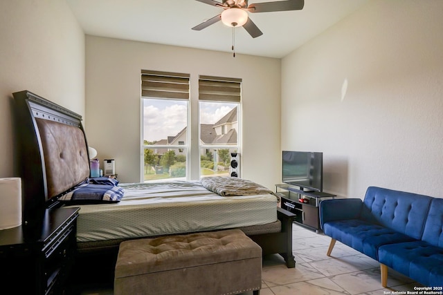 4019 Wood Crk, San Antonio, TX 78257 - bedroom featuring light marble finish floors and ceiling fan