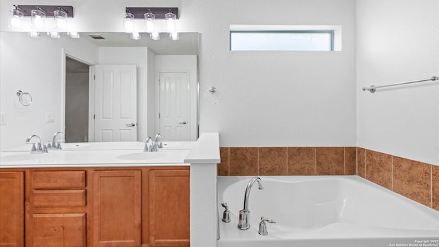 154 Sassafras, Kyle, TX 78640 - full bath featuring a bath and double vanity