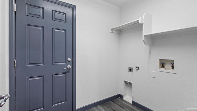 154 Sassafras, Kyle, TX 78640 - clothes washing area featuring washer hookup, baseboards, electric dryer hookup, and dark wood finished floors