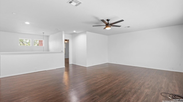 154 Sassafras, Kyle, TX 78640 - empty room with a ceiling fan, recessed lighting, dark wood-type flooring, and baseboards