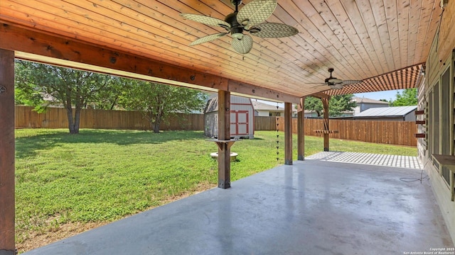 154 Sassafras, Kyle, TX 78640 - view of patio / terrace featuring a ceiling fan, a storage shed, and an outdoor structure