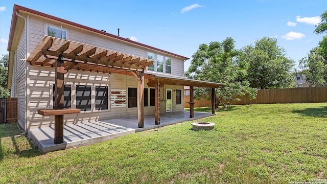 154 Sassafras, Kyle, TX 78640 - back of house with an outdoor fire pit, a pergola, and a patio area