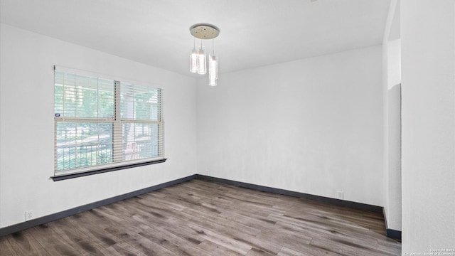 154 Sassafras, Kyle, TX 78640 - empty room featuring wood finished floors and baseboards