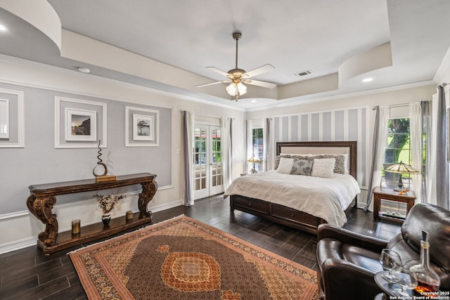 24 Rogers Wood, San Antonio, TX 78248 - bedroom featuring dark wood-style floors, access to exterior, multiple windows, a tray ceiling, and ornamental molding