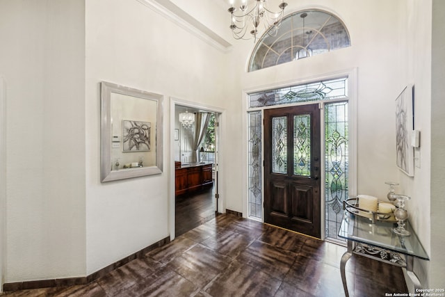 24 Rogers Wood, San Antonio, TX 78248 - entryway featuring a chandelier, a high ceiling, ornamental molding, and baseboards