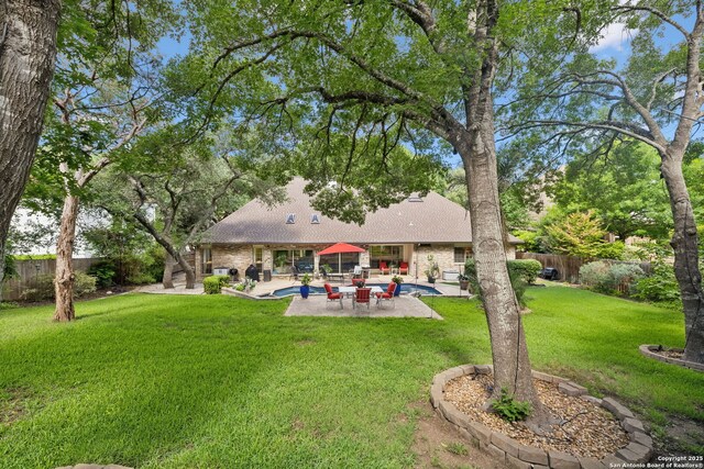 24 Rogers Wood, San Antonio, TX 78248 - back of house with a patio area and roof with shingles